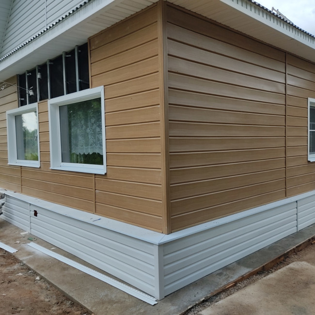 Фасады - фото наших работ — СК "Дом и Дача" - обшивка дома сайдингом — фото