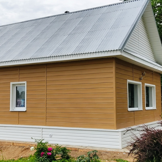 Фасады - фото наших работ — СК "Дом и Дача" - обшивка дома сайдингом — фото