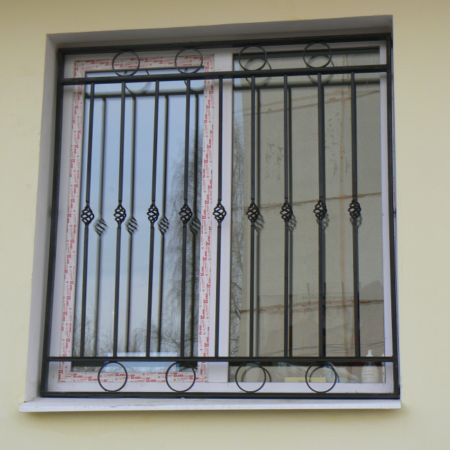 Решетки — решетка с кованными элементами — фото